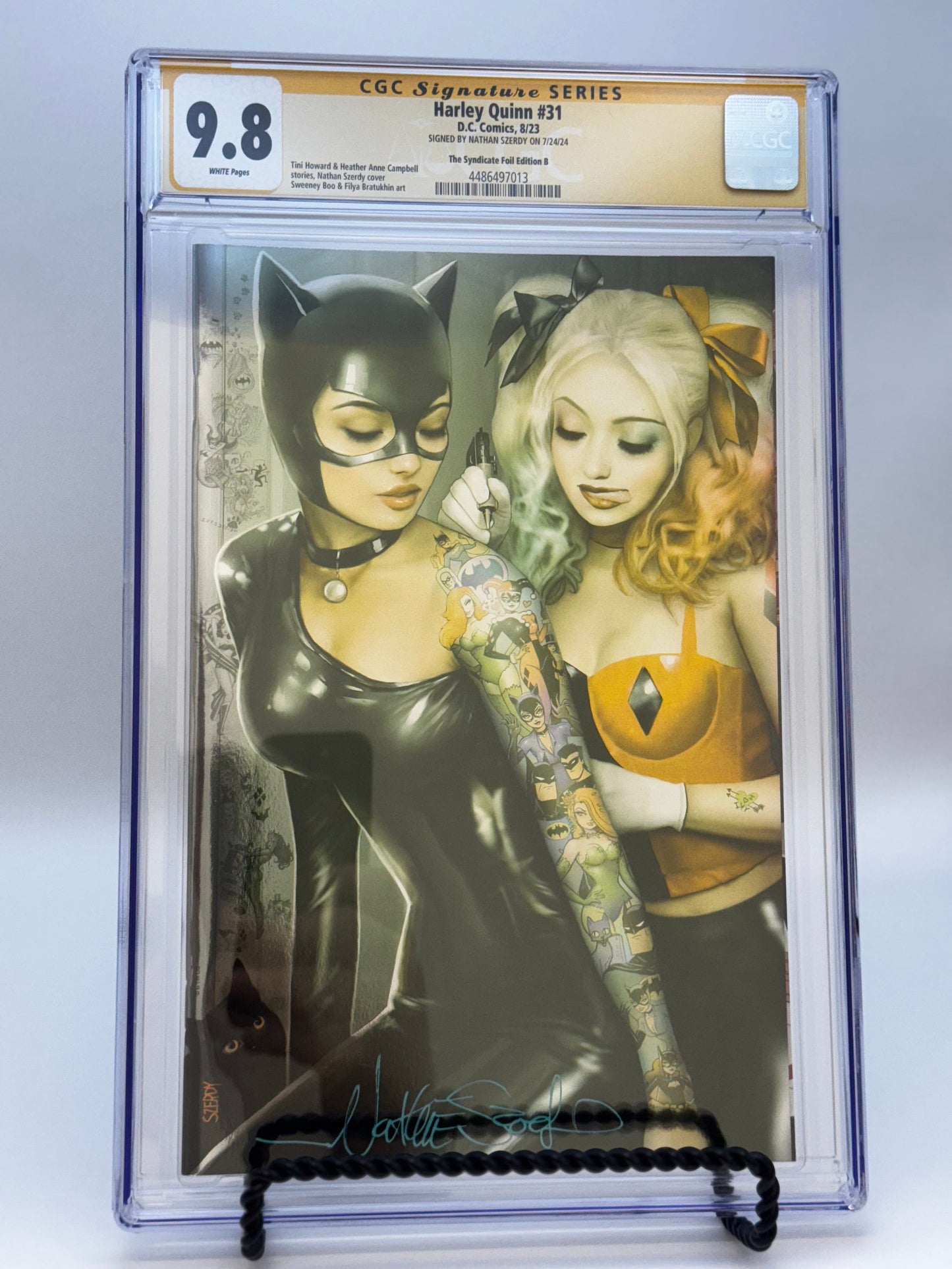 [SIGNED BY NATHAN SZERDY][FOIL] HARLEY QUINN #31 NATHAN SZERDY (616) EXCLUSIVE CATWOMAN TATTOO FOIL VIRGIN VAR CGC 9.8 YELLOW LABEL [IN STOCK]